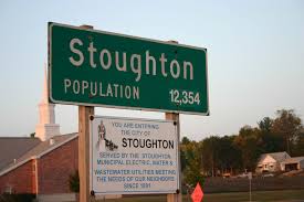 Out with the Stoughton town manager, say police, fire unions